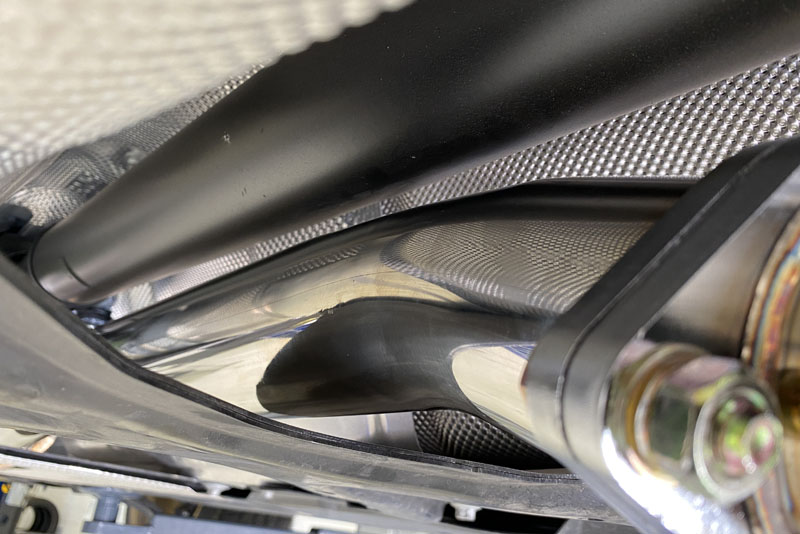 Closeup of the Cat Back Exhaust fitting like OEM